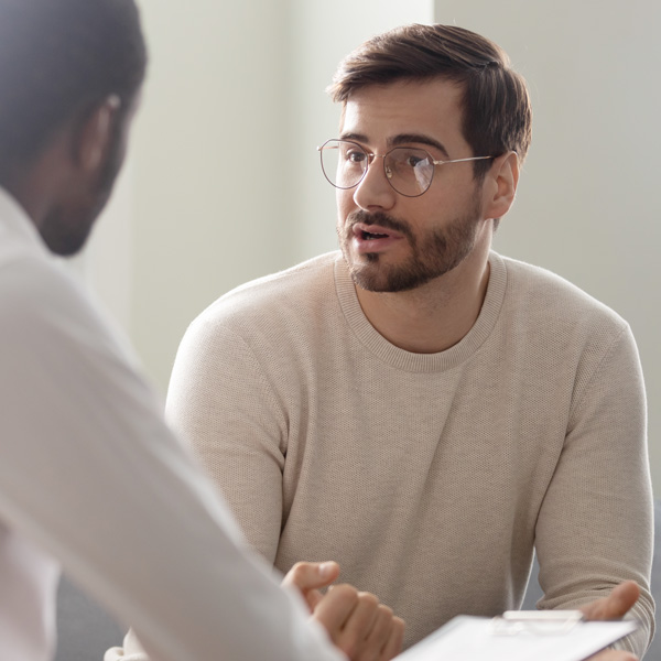 Man consulting with psychologist