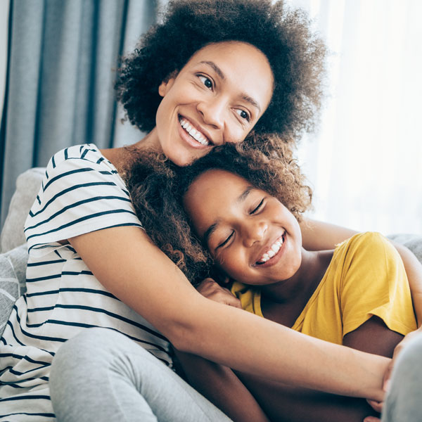 Mother and little daughter at home
