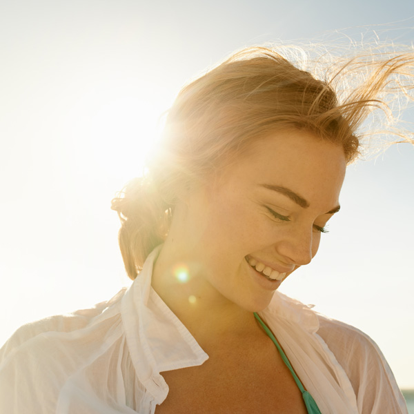 Beautiful Young Woman at the Beach